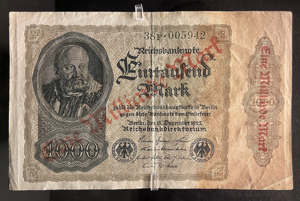 The Papiermark was the German currency from 4 August 1914  to 14 November 1923. Source; Wikimedia Commons

Eintausend Mark Reichsbanknote 15. Dezember 1922, 1000 marks bill of the Weimar Republic 1922, overprinted/overstamped with Eine Milliarde Mark, 1 billion marks, in the inflation period in 1923. Portrait of mintmaster Jörg Herz (1492 – 1554).
The Papiermark was the German currency from 4 August 1914 when the link between the Goldmark and gold was abandoned, due to the outbreak of World War I. In particular, the Papiermarks was the currency issued during the hyperinflation in Weimar Germany of 1922 and 1923. The Rentenmark was a currency issued on 15 November 1923 to stop the hyperinflation, after the previously used "paper" Mark had become almost worthless. It was replaced in 1924 by the Reichsmark.