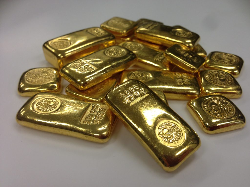 Gold bars, Gold bullion. Source: Wikimedia Commons