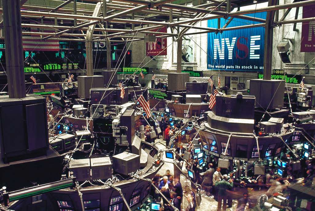 New York Stock Exchange trading floor on Wall Street, New York, New York. Source: Picryl
Stocks and Shares: A Basic Investment Primer for Beginners